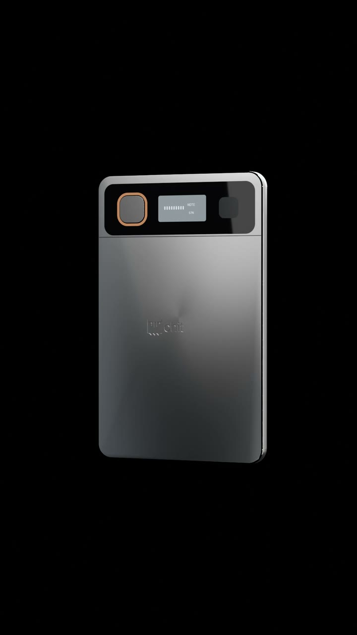 A rendering of chit one turning slowly in the dark — the card, its black display band and the record key catching one light.